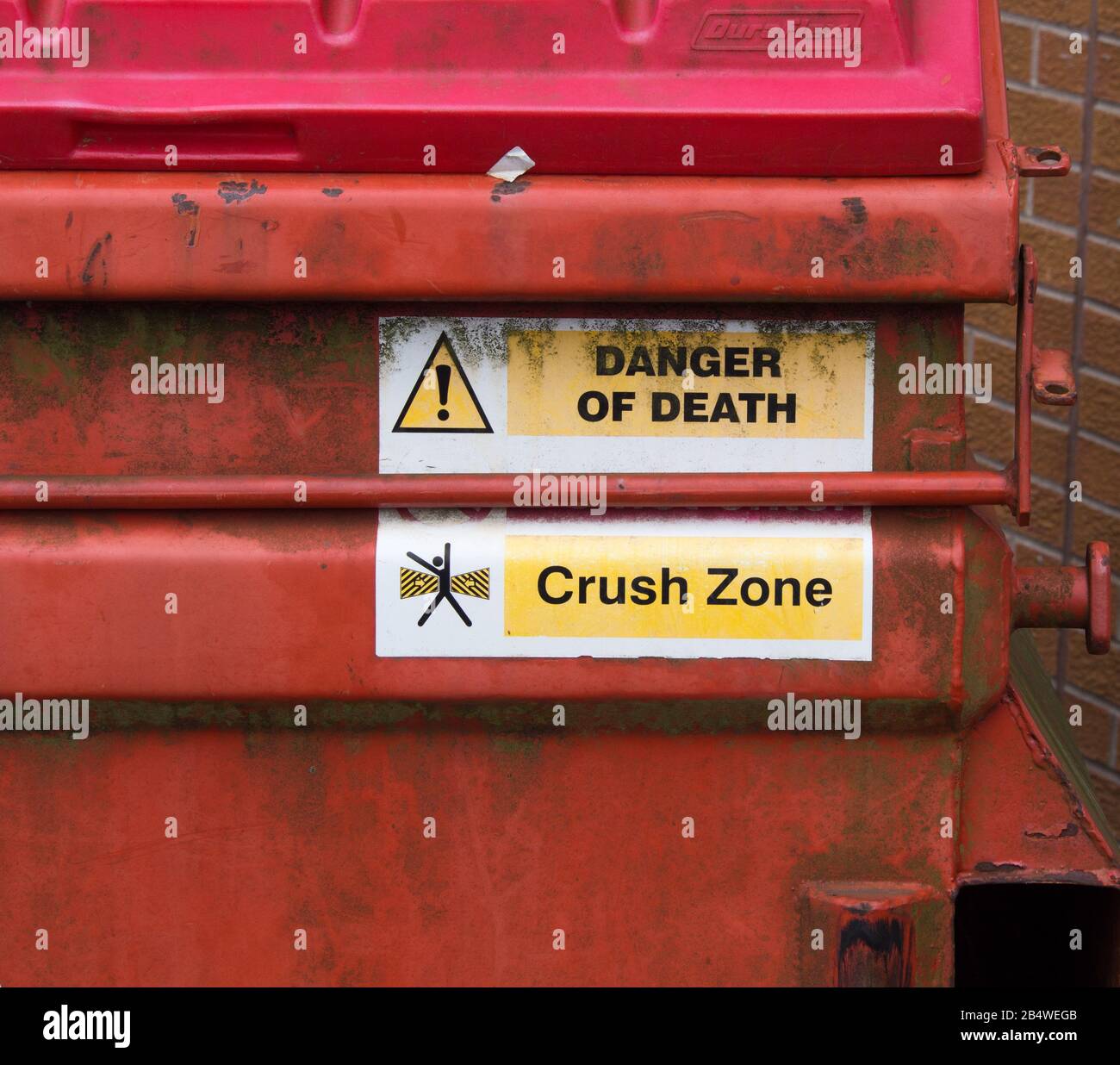 Warning signs, `danger of death, `crush zone' Stock Photo